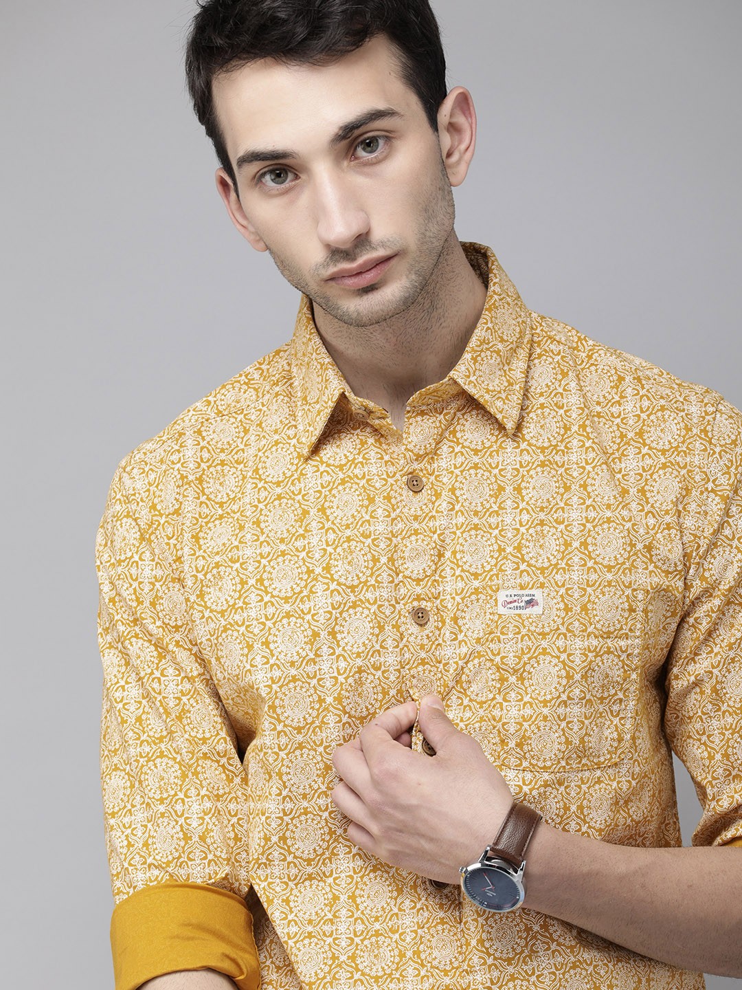 U S Polo Assn Denim Co Men Mustard Yellow & White Cotton Slim Fit Ethnic Printed Shirt
U S Polo Assn Denim Co Men Mustard Yellow & White Cotton Slim Fit Ethnic Printed Shirt