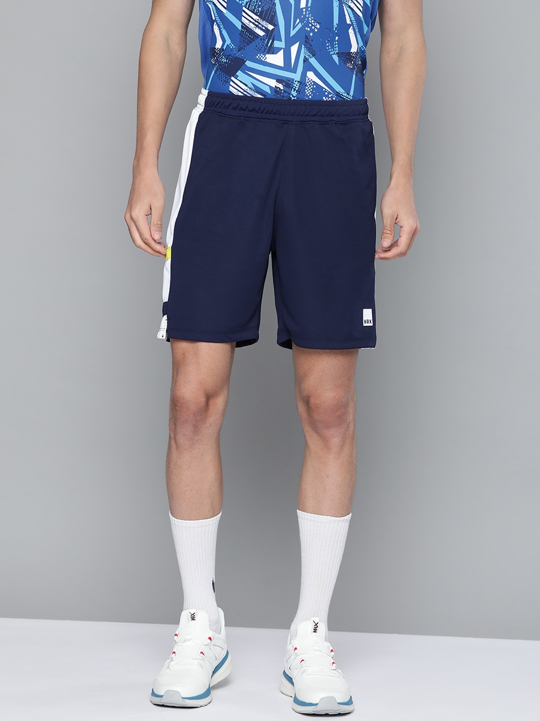 HRX By Hrithik Roshan Racket Sports Men Optic White Rapid-Dry Colourblock Shorts, Navy blue
HRX By Hrithik Roshan Racket Sports Men Optic White Rapid-Dry Colourblock Shorts, Navy blue