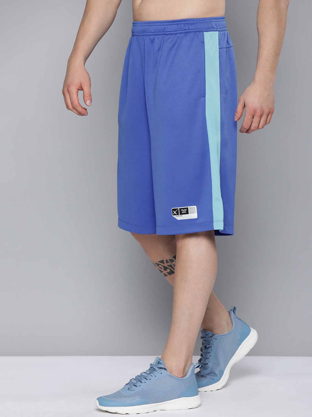 HRX By Hrithik Roshan Men Strong Blue & Aquarius Rapid-Dry Colourblock Basketball Shorts
HRX By Hrithik Roshan Men Strong Blue & Aquarius Rapid-Dry Colourblock Basketball Shorts