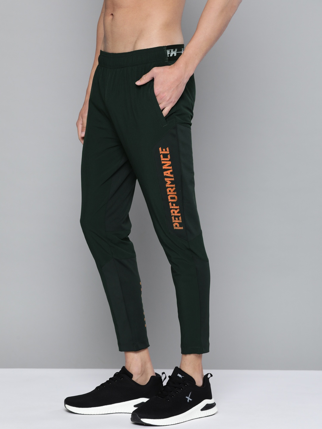 HRX By Hrithik Roshan Training Men Elephant Grey Rapid-Dry Brand Carrier Track Pants, Green
HRX By Hrithik Roshan Training Men Elephant Grey Rapid-Dry Brand Carrier Track Pants, Green