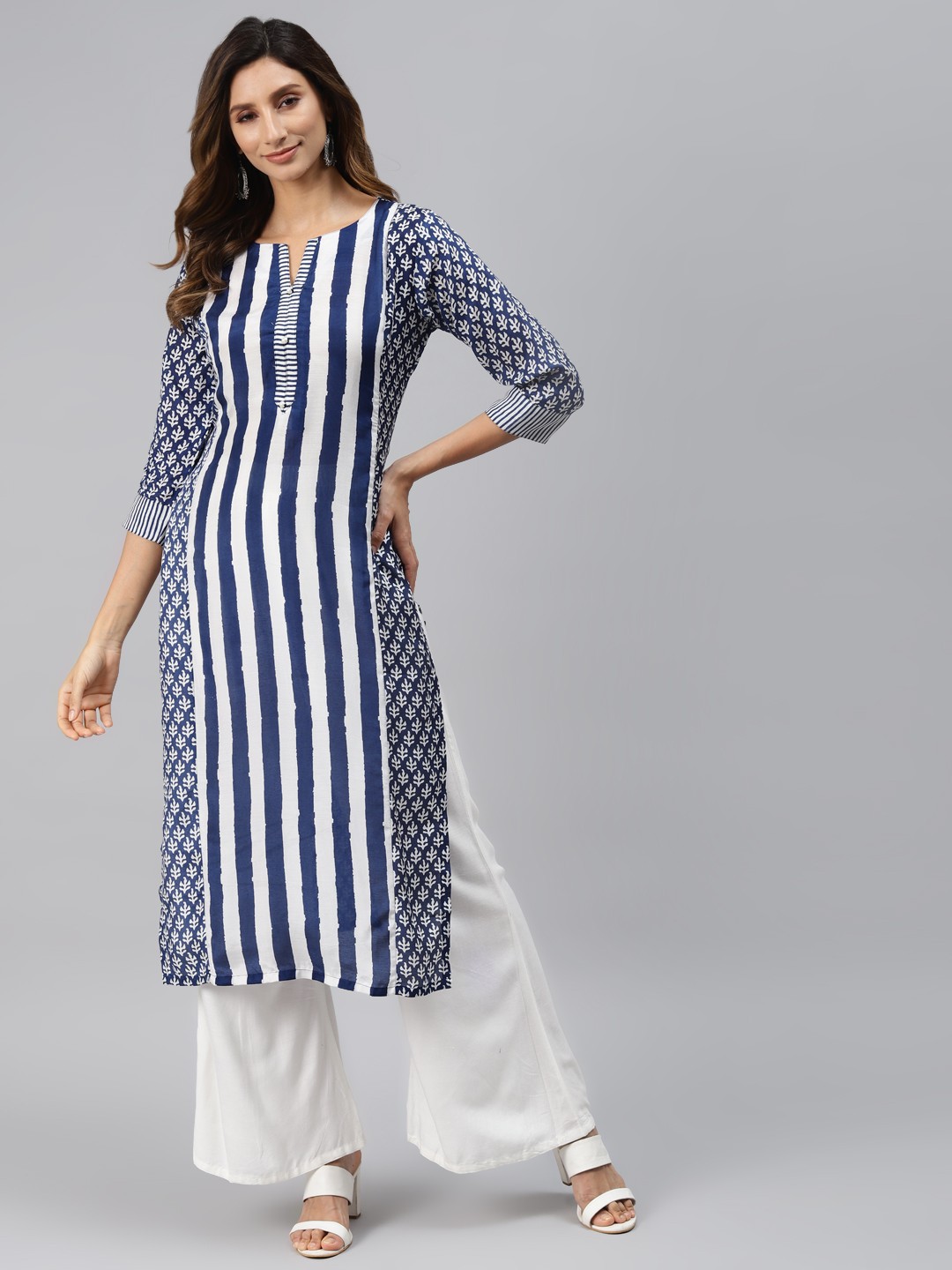 Readiprint Fashions Women Blue & White Ethnic Motifs Striped Regular Kurta with Palazzos
Readiprint Fashions Women Blue & White Ethnic Motifs Striped Regular Kurta with Palazzos