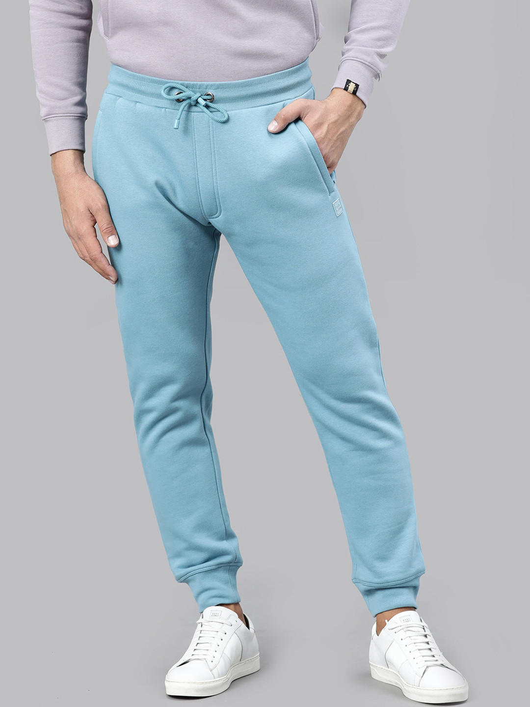 RARE RABBIT Men Panama Slim Fit Solid joggers, Blue 
RARE RABBIT Men Panama Slim Fit Solid joggers, Blue