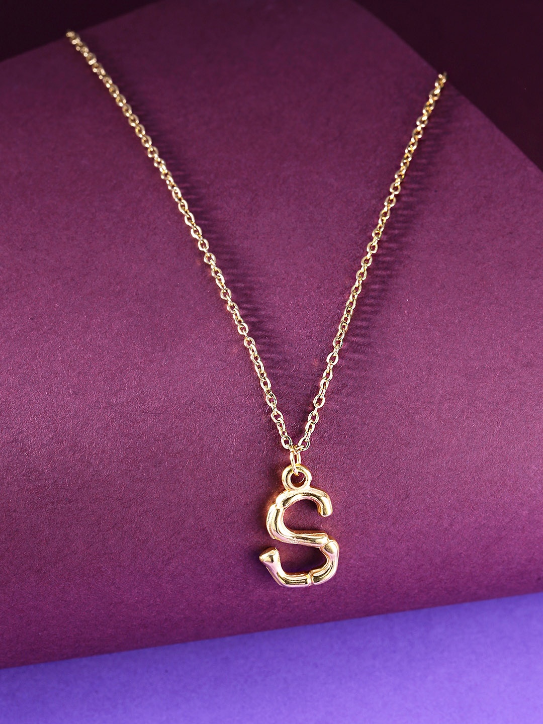 Yellow Chimes Gold-Plated Stainless Steel Initial Alphabet Letter S Pendant With Chain
Yellow Chimes Gold-Plated Stainless Steel Initial Alphabet Letter S Pendant With Chain