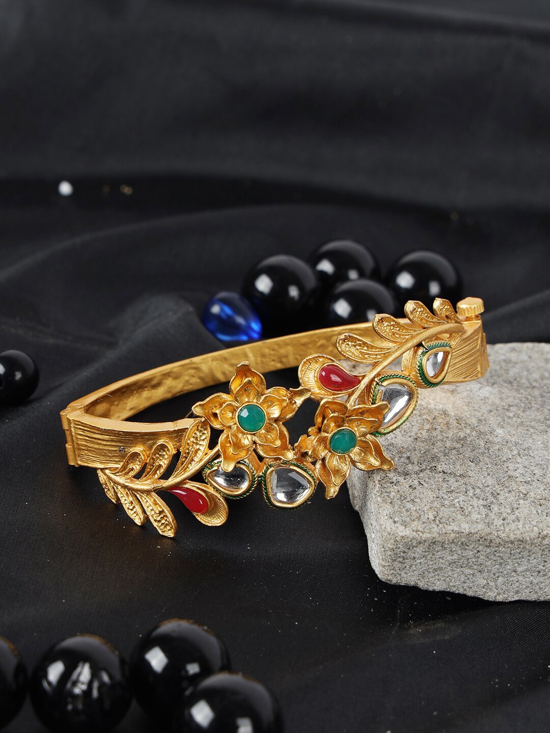 ANIKAS CREATION Women Gold-Toned & Green Cubic Zirconia Gold-Plated Bangle-Style Bracelet
ANIKAS CREATION Women Gold-Toned & Green Cubic Zirconia Gold-Plated Bangle-Style Bracelet