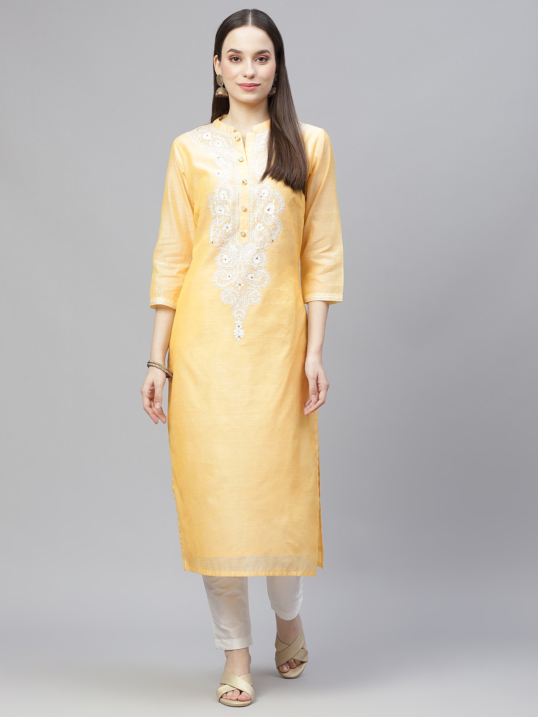 Tulsattva Women Yellow & White Ethnic Yoke Design Regular Aari Work Kurta with Trousers
Tulsattva Women Yellow & White Ethnic Yoke Design Regular Aari Work Kurta with Trousers