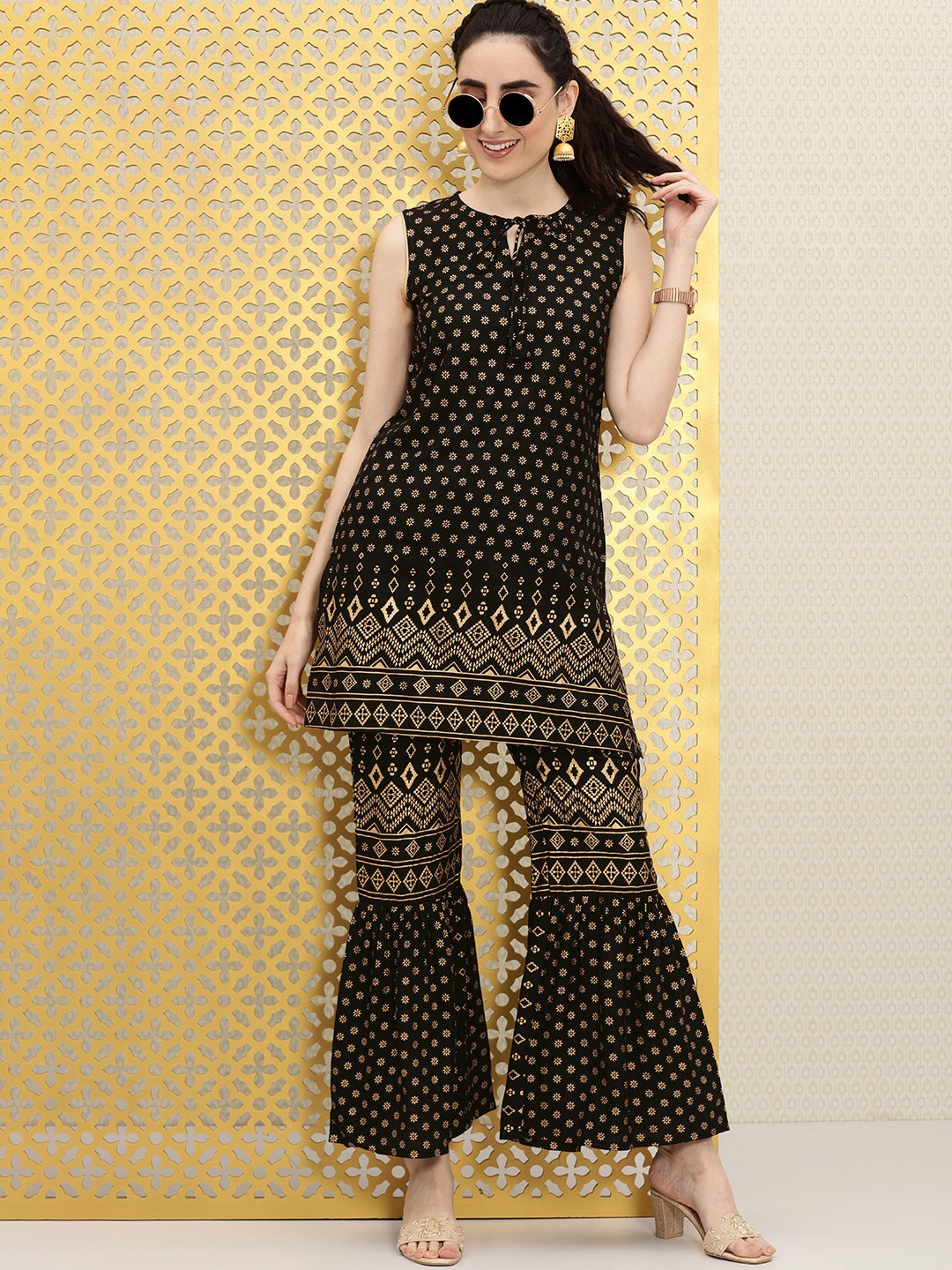 Ode by House of Pataudi Women Black Ethnic Motifs Printed Regular Jashn Kurti with Sharara
Ode by House of Pataudi Women Black Ethnic Motifs Printed Regular Jashn Kurti with Sharara