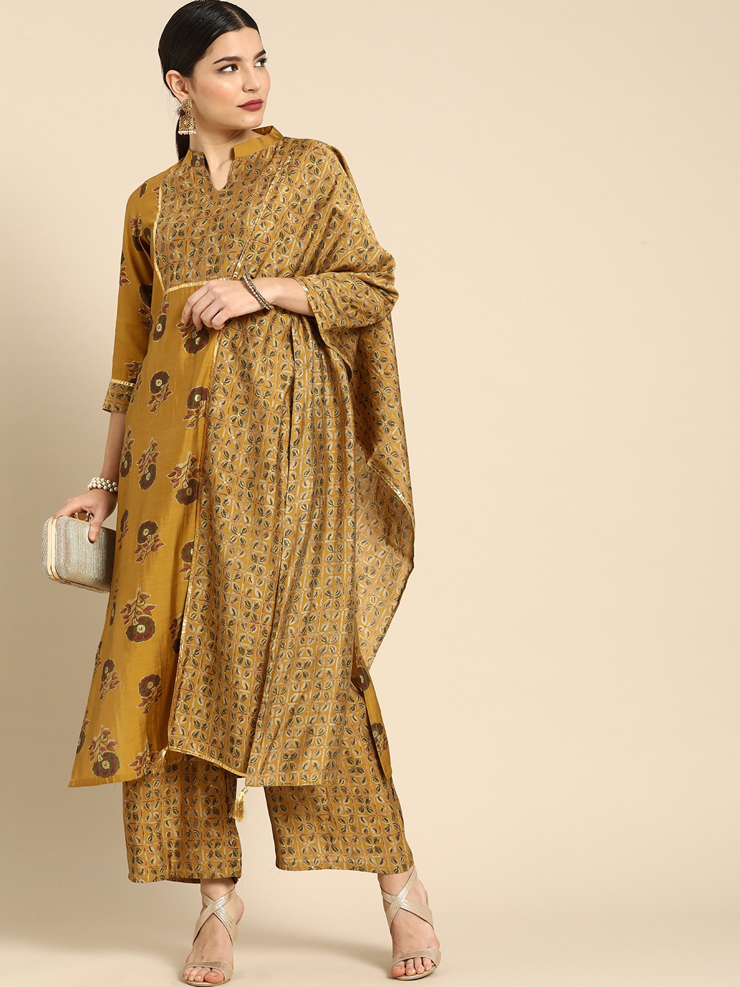 Anouk Women Mustard Yellow Printed Regular Kurta with Palazzos & With Dupatta
Anouk Women Mustard Yellow Printed Regular Kurta with Palazzos & With Dupatta