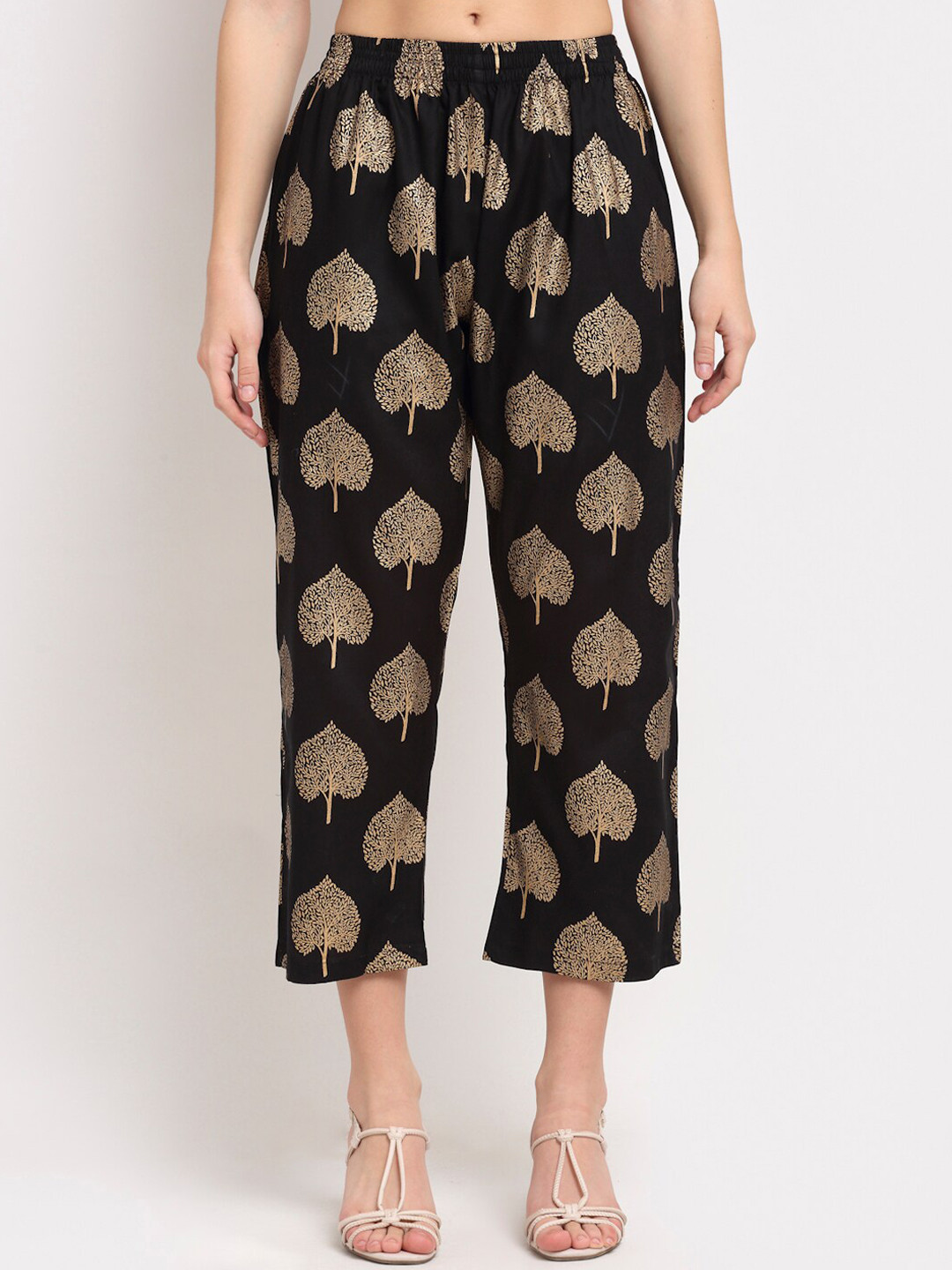 Rudra Bazaar Women Black & Gold-Coloured Ethnic Motifs Printed Cropped Parallel Trousers
Rudra Bazaar Women Black & Gold-Coloured Ethnic Motifs Printed Cropped Parallel Trousers