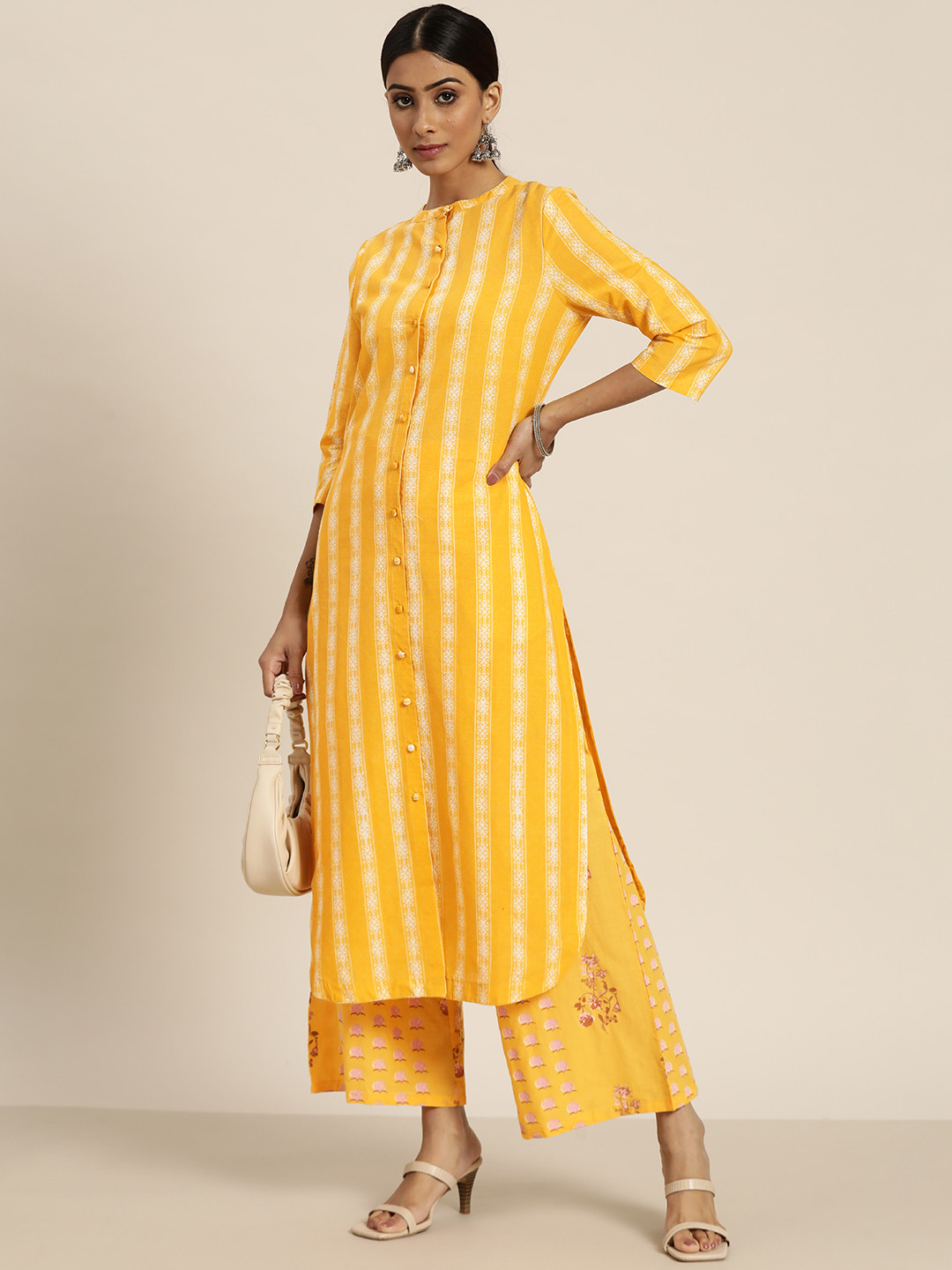 Moda Rapido Women Yellow & White Ethnic Printed Regular Pure Cotton Kurta with Palazzos
Moda Rapido Women Yellow & White Ethnic Printed Regular Pure Cotton Kurta with Palazzos