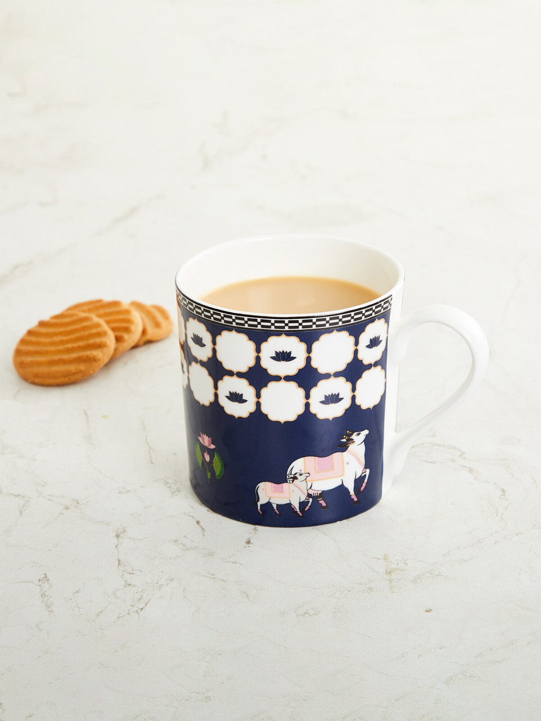 Home Centre Blue Charlie Cow & Calf Printed Bone China Mug 400ml
Home Centre Blue Charlie Cow & Calf Printed Bone China Mug 400ml
