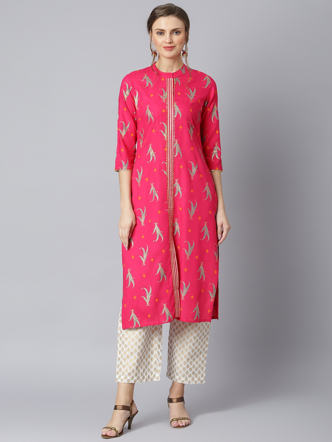 Khushal K Women Pink & Gold-Toned Ethnic Motifs Printed Panelled Kurta with Trousers
Khushal K Women Pink & Gold-Toned Ethnic Motifs Printed Panelled Kurta with Trousers