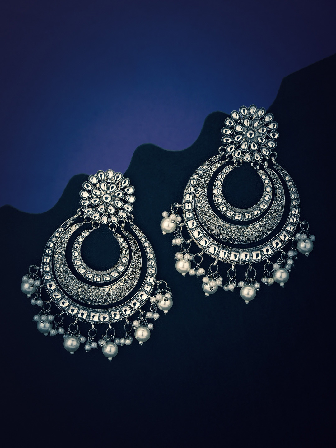 KOLHA-BY CARLTON Oxidised Silver-Toned Rhodium Plated Stone studded & Beaded Chandbalis
KOLHA-BY CARLTON Oxidised Silver-Toned Rhodium Plated Stone studded & Beaded Chandbalis