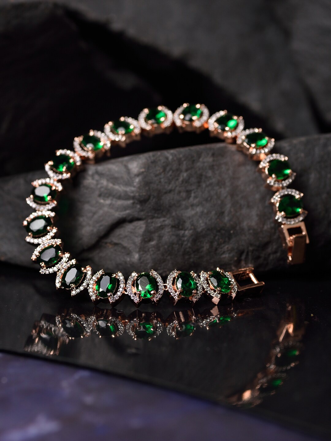 Saraf RS Jewellery Women Rose Gold & Green Brass AD Studded Wraparound Bracelet
Saraf RS Jewellery Women Rose Gold & Green Brass AD Studded Wraparound Bracelet