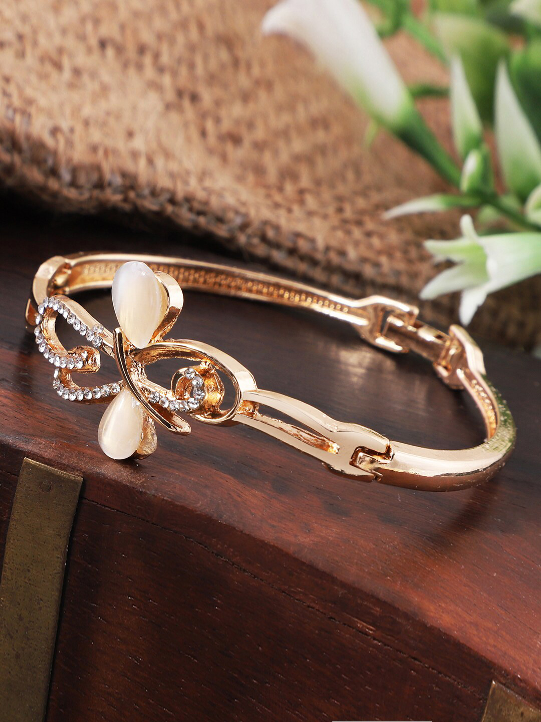ANIKAS CREATION Women Rose Gold & White Brass Handcrafted Rose Gold-Plated Bangle-Style Bracelet
ANIKAS CREATION Women Rose Gold & White Brass Handcrafted Rose Gold-Plated Bangle-Style Bracelet