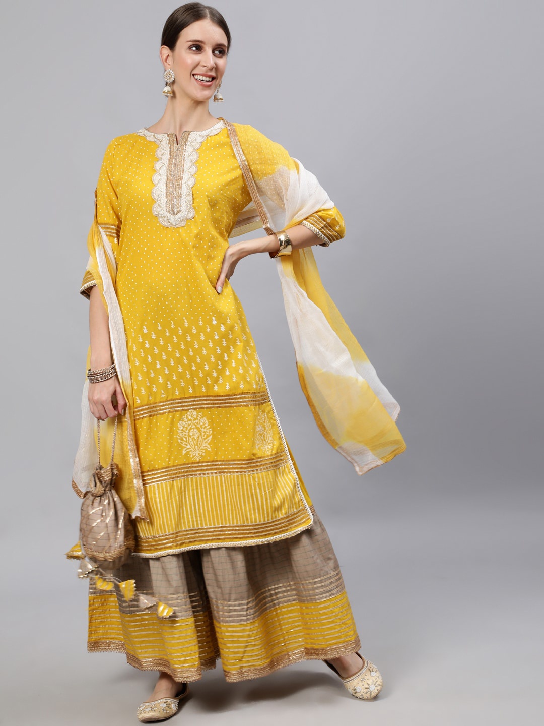 Ishin Women Mustard Yellow & Brpwn Ethnic Motifs Printed Kurta with Sharara & Dupatta
Ishin Women Mustard Yellow & Brpwn Ethnic Motifs Printed Kurta with Sharara & Dupatta