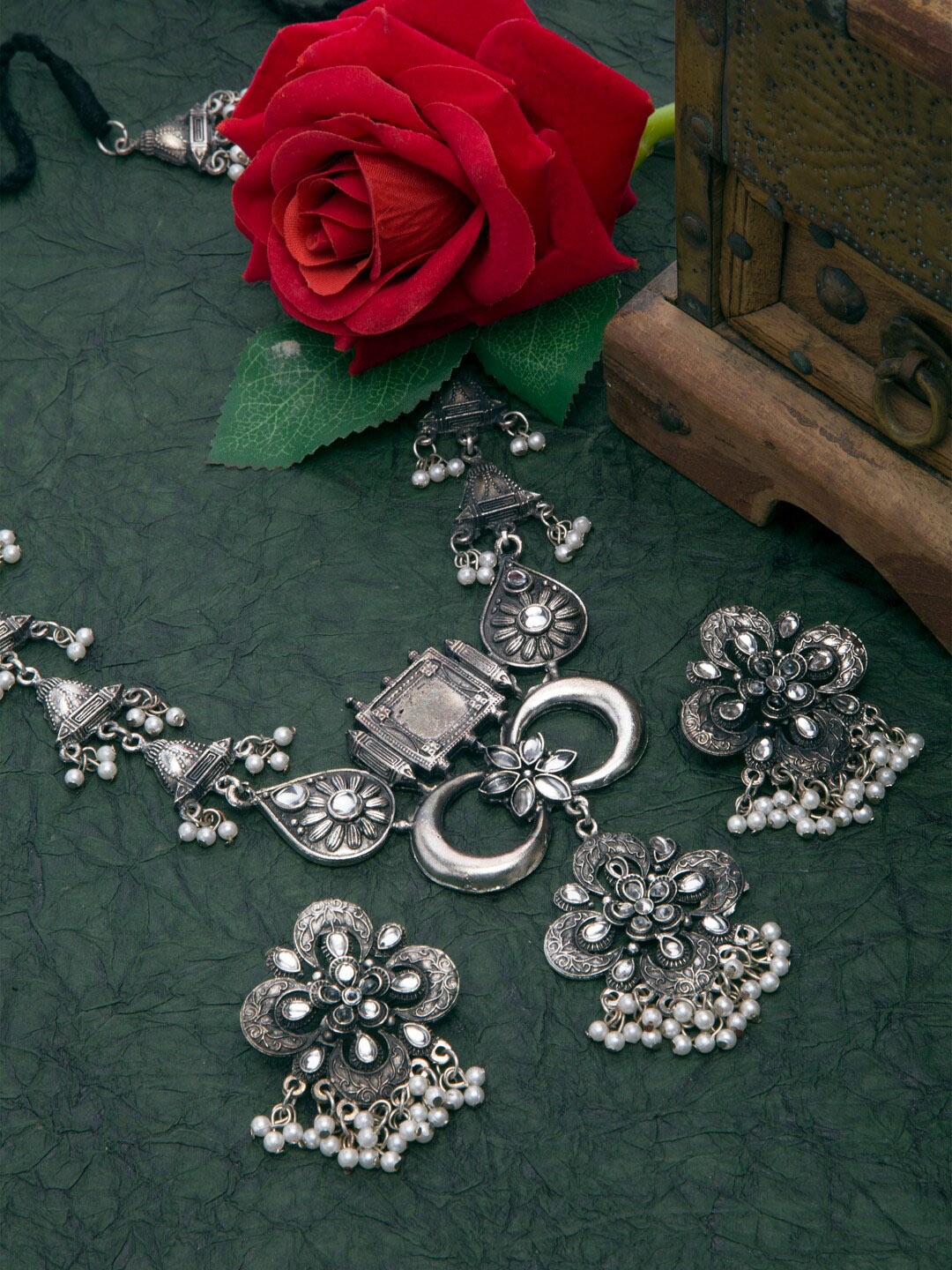 Moedbuille Oxidised Silver-Plated White Stone Studded & Beaded Handcrafted Jewellery Set
Moedbuille Oxidised Silver-Plated White Stone Studded & Beaded Handcrafted Jewellery Set