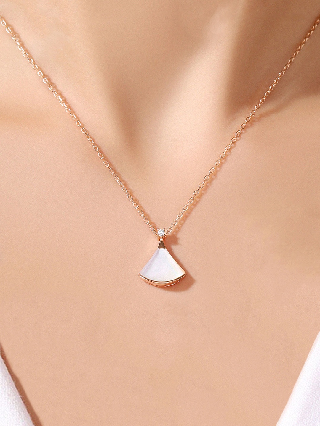 Yellow Chimes Rose Gold-Plated & White Stone-Studded Stainless Steel Pendant With Chain
Yellow Chimes Rose Gold-Plated & White Stone-Studded Stainless Steel Pendant With Chain