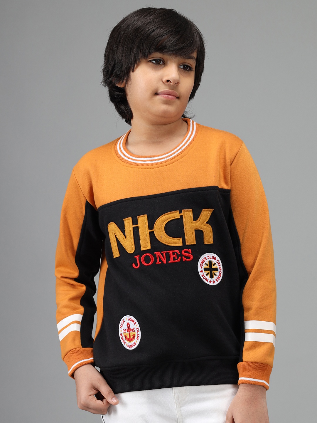 Nick and Jones Boys Black & Mustard Yellow Colourblocked Sweatshirt with Applique Detail
Nick and Jones Boys Black & Mustard Yellow Colourblocked Sweatshirt with Applique Detail