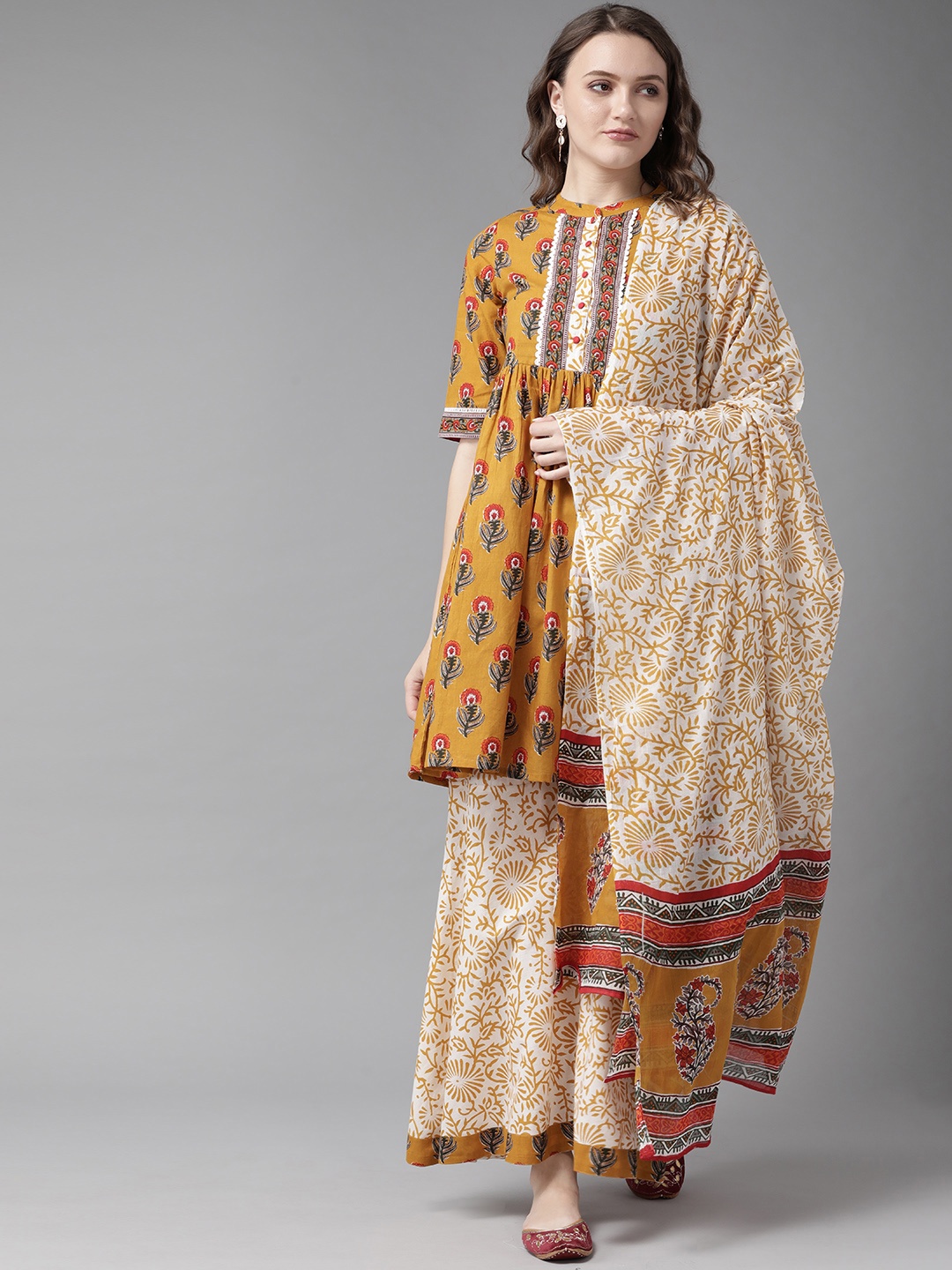 Amirah s Women Mustard Yellow Floral Printed Empire Pure Cotton Kurta with Sharara & With Dupatta
Amirah s Women Mustard Yellow Floral Printed Empire Pure Cotton Kurta with Sharara & With Dupatta