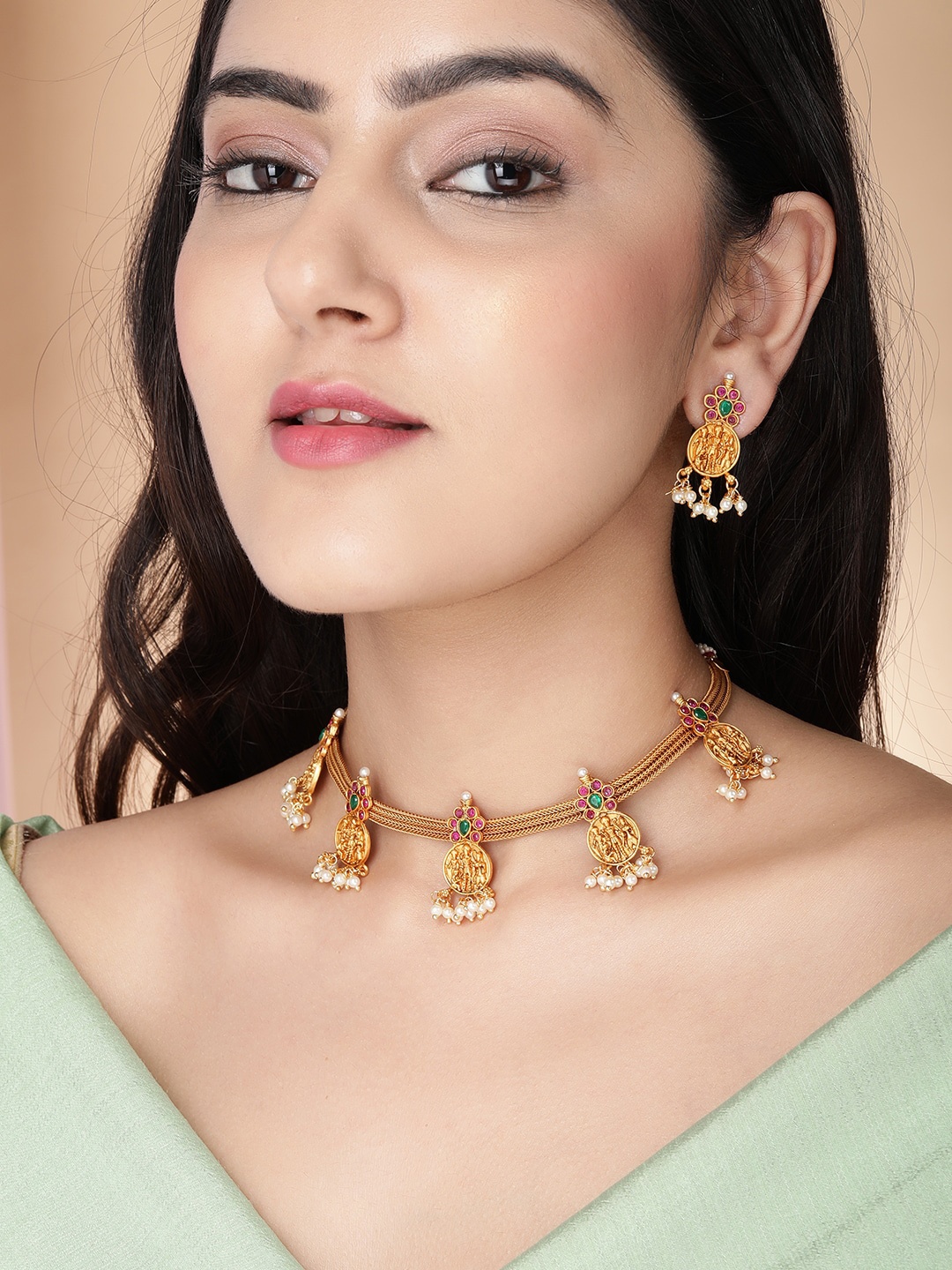 Rubans Gold-Plated Pink & Green Stone-Studded & Beaded Handcrafted Temple Jewellery Set
Rubans Gold-Plated Pink & Green Stone-Studded & Beaded Handcrafted Temple Jewellery Set