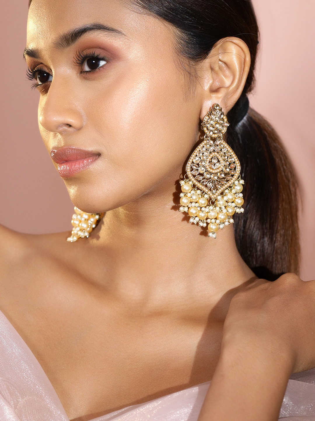 Rubans 18K Gold-Plated Kundan & Glosssy Off-White Pearl Beaded Chandelier Earrings
Rubans 18K Gold-Plated Kundan & Glosssy Off-White Pearl Beaded Chandelier Earrings
