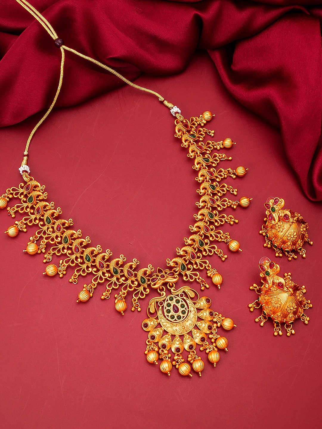 aadita Gold-Plated Green & Pink Stone-Studded Pearl Beaded Handcrafted Jewellery Set
aadita Gold-Plated Green & Pink Stone-Studded Pearl Beaded Handcrafted Jewellery Set