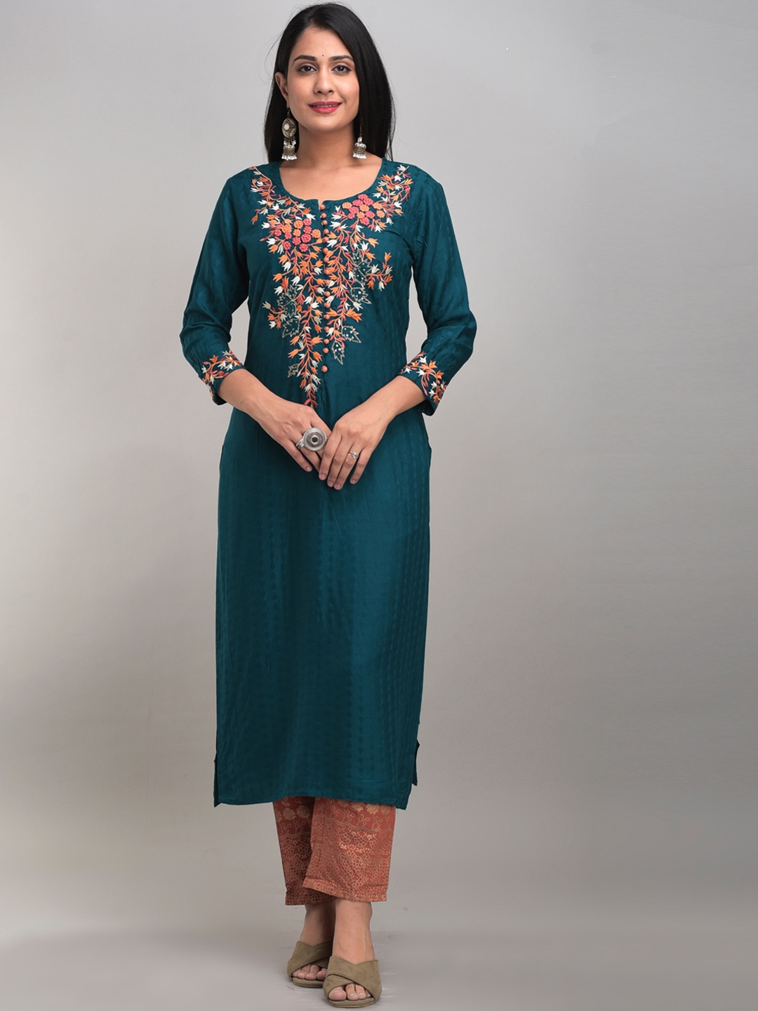 DIVYANK Women Teal Blue & Rust Brown Yoke Embroidere Pure Cotton Kurta with Palazzos
DIVYANK Women Teal Blue & Rust Brown Yoke Embroidere Pure Cotton Kurta with Palazzos