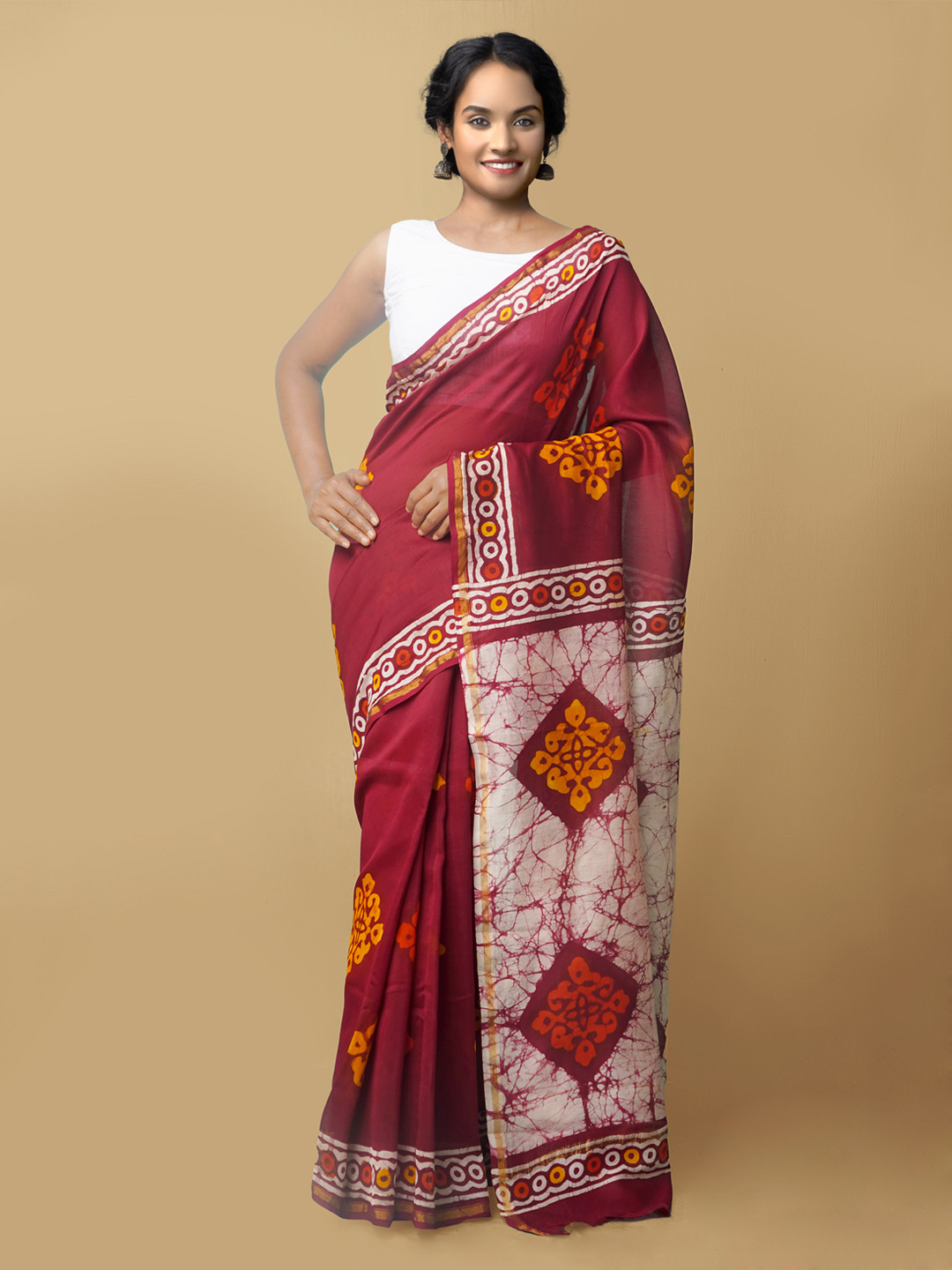 Unnati Silks Maroon & White Batik Silk Cotton Chanderi Saree
Unnati Silks Maroon & White Batik Silk Cotton Chanderi Saree