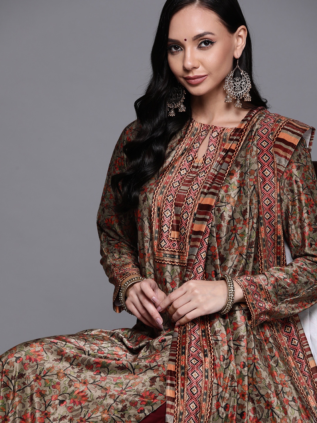 Libas Women Olive Green Floral Printed Regular Velvet Kurta with Palazzos & With Dupatta
Libas Women Olive Green Floral Printed Regular Velvet Kurta with Palazzos & With Dupatta