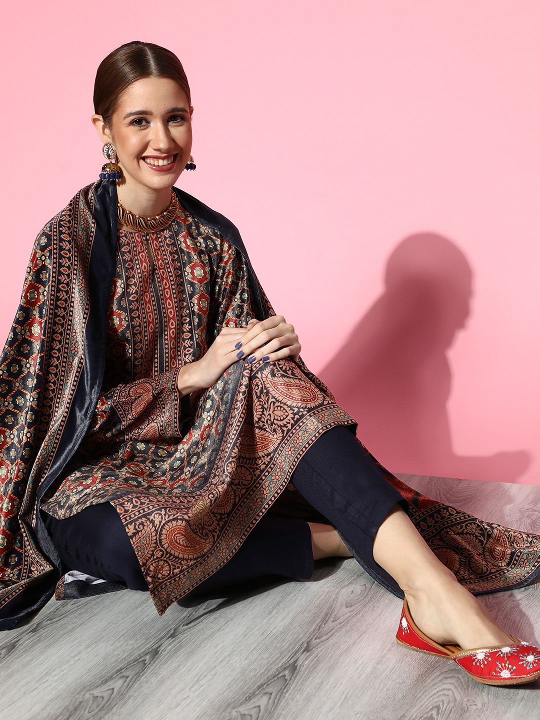 Libas Women Navy Blue Ethnic Motifs Printed Regular Velvet Kurta with Palazzos & With Dupatta
Libas Women Navy Blue Ethnic Motifs Printed Regular Velvet Kurta with Palazzos & With Dupatta