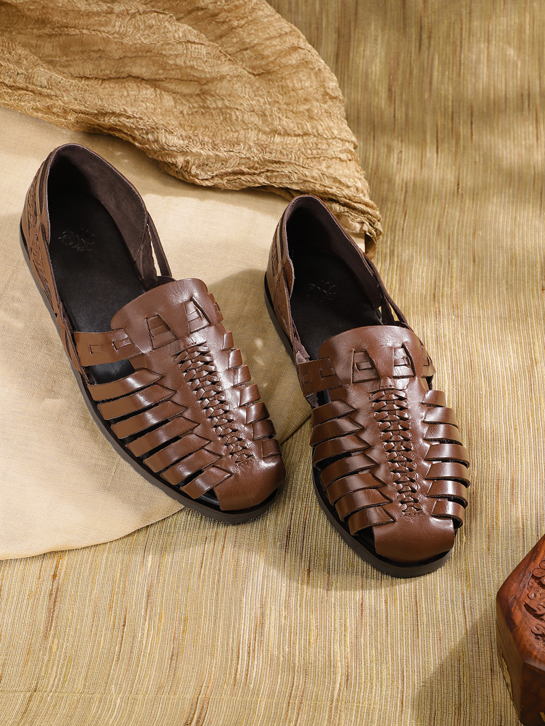 House of Pataudi Men Coffee Brown Handcrafted Braided Detail Leather Fisherman Sandals
House of Pataudi Men Coffee Brown Handcrafted Braided Detail Leather Fisherman Sandals