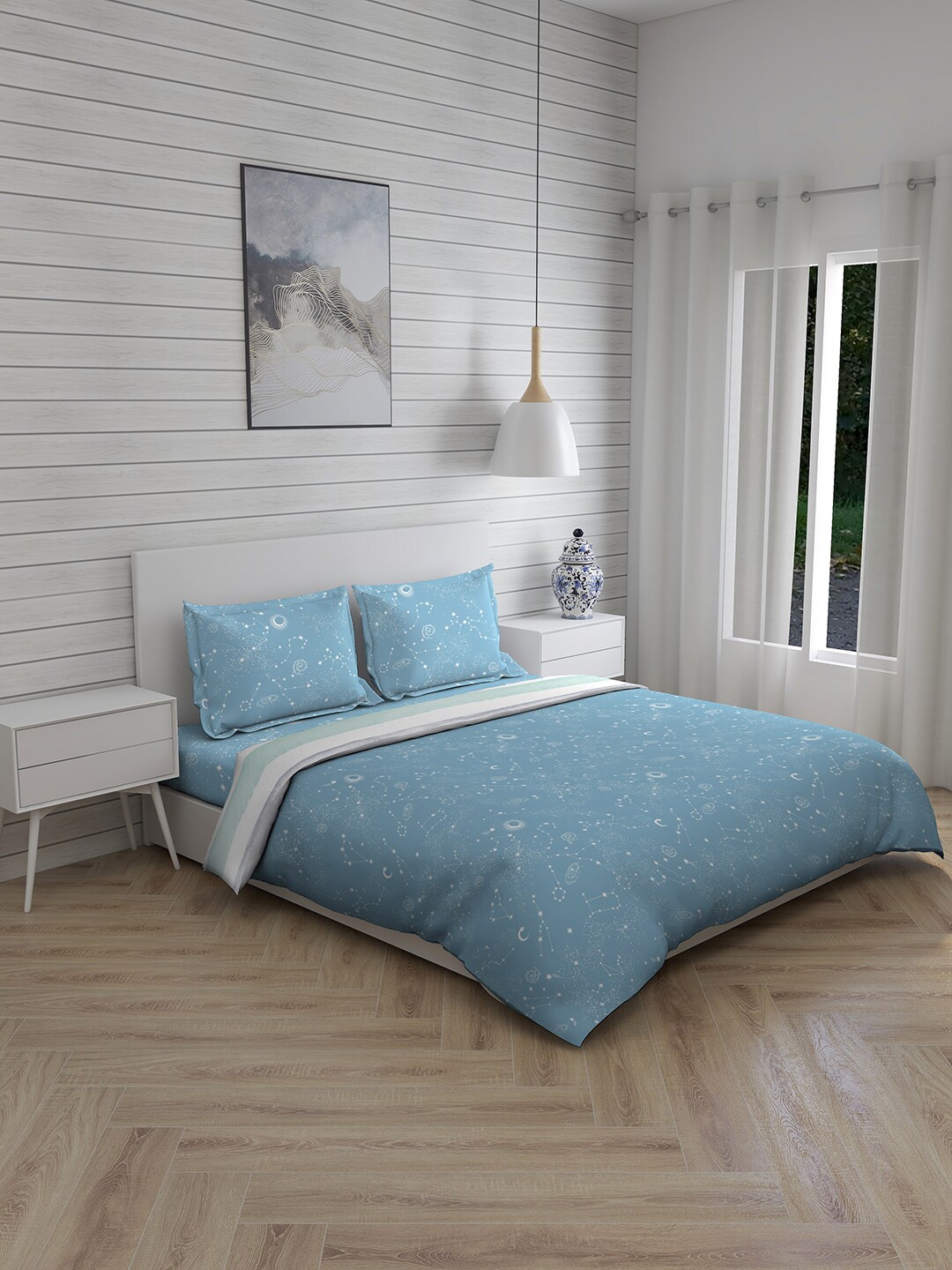 Layers Blue & White Graphic 150 TC Cotton King Bedsheet with 2 Pillow Covers & Comforter
Layers Blue & White Graphic 150 TC Cotton King Bedsheet with 2 Pillow Covers & Comforter
