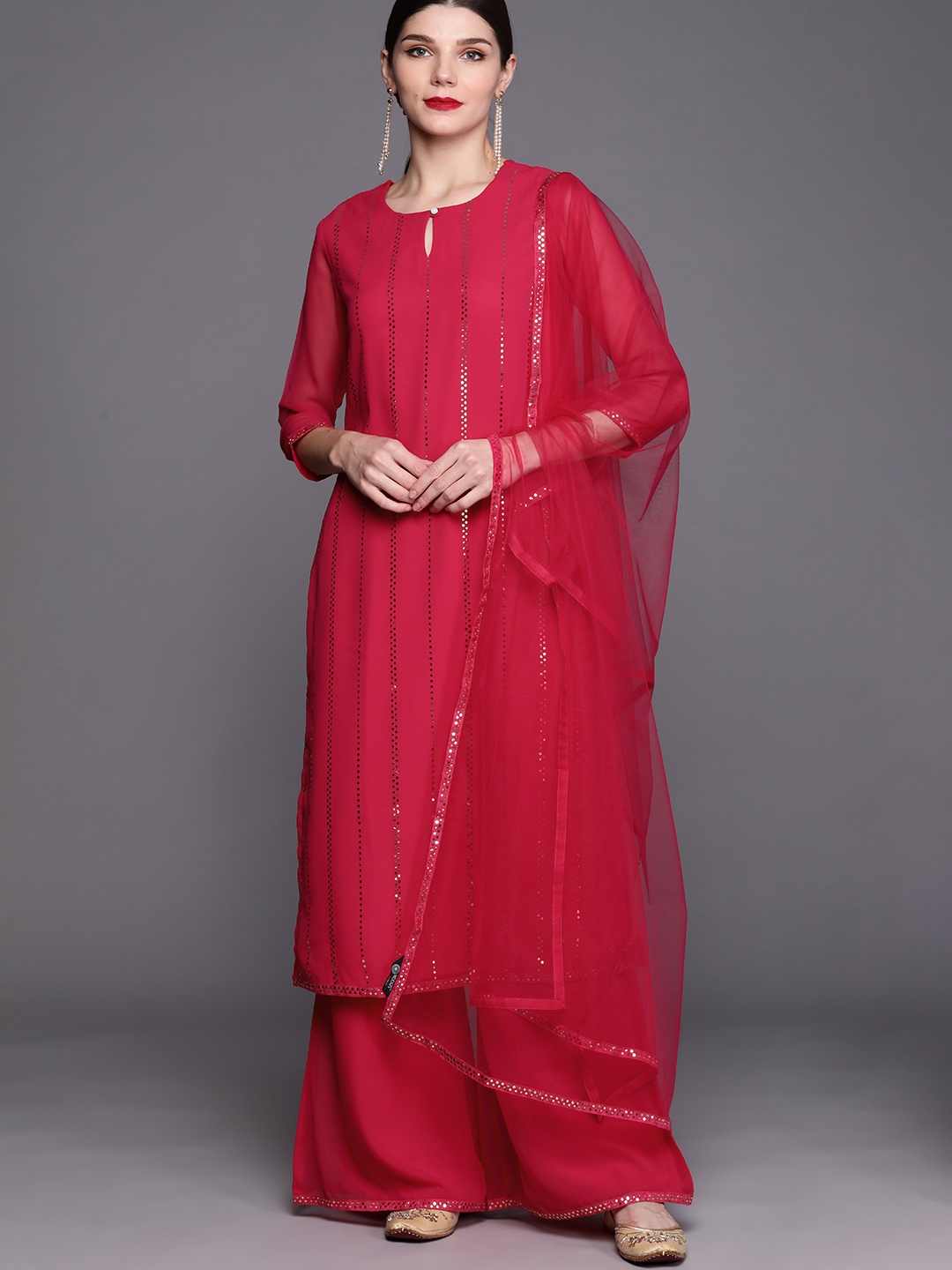 Inddus Women Magenta Striped Regular Beads and Stones Kurta with Palazzos & With Dupatta
Inddus Women Magenta Striped Regular Beads and Stones Kurta with Palazzos & With Dupatta