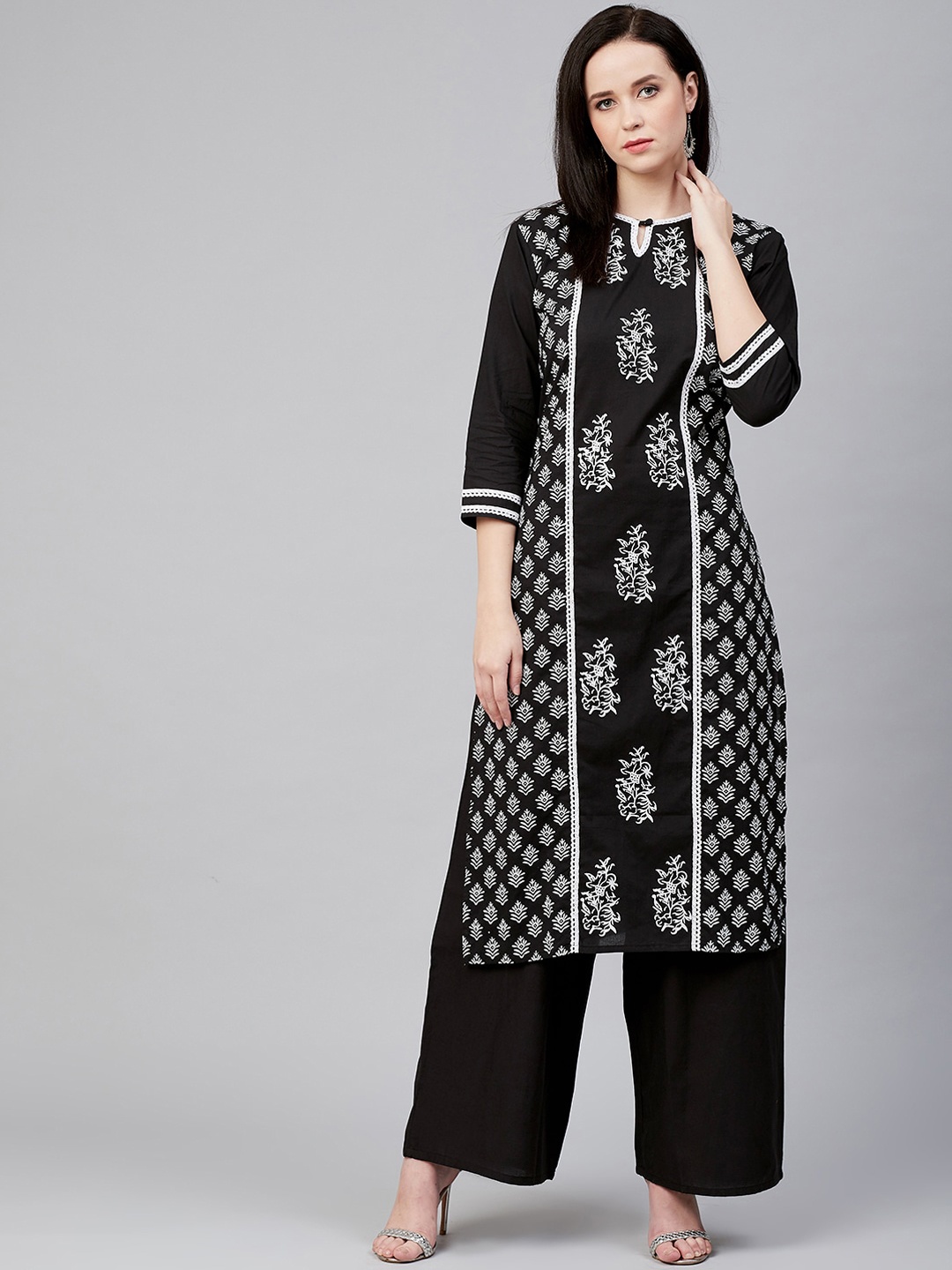 Bhama Couture Women Black & White Ethnic Motifs Printed Panelled Kurta with Palazzos
Bhama Couture Women Black & White Ethnic Motifs Printed Panelled Kurta with Palazzos