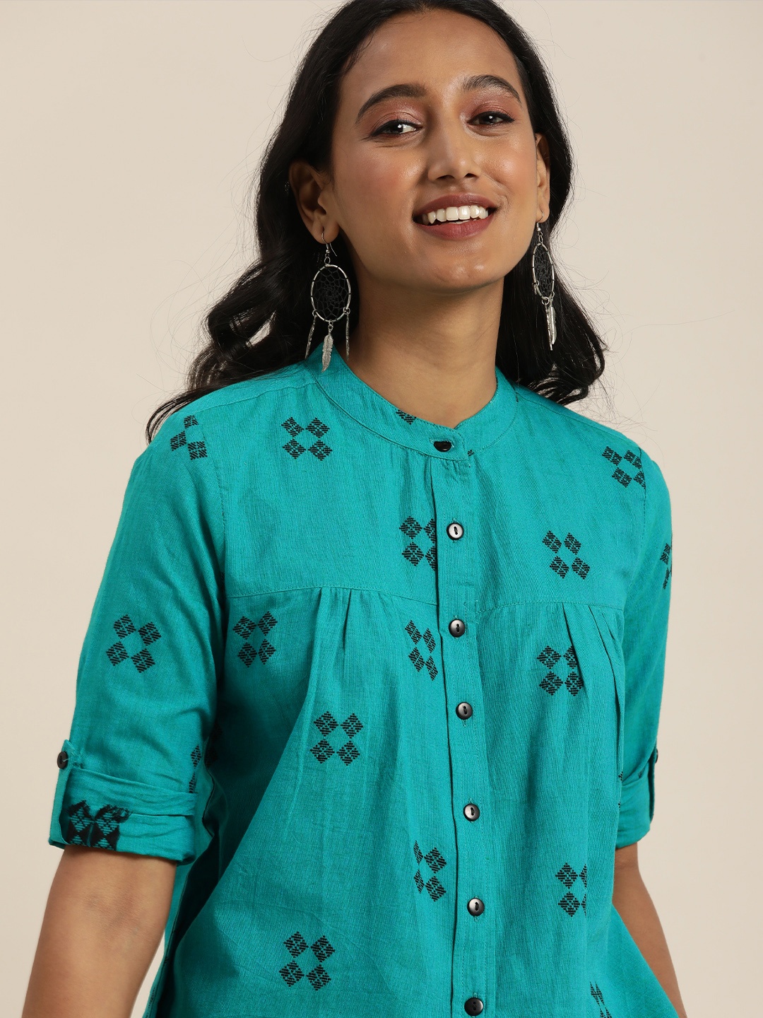Taavi Women Teal Printed Mandarin Collar Woven Legacy Shirt Style Top With Roll-Up Sleeves
Taavi Women Teal Printed Mandarin Collar Woven Legacy Shirt Style Top With Roll-Up Sleeves
