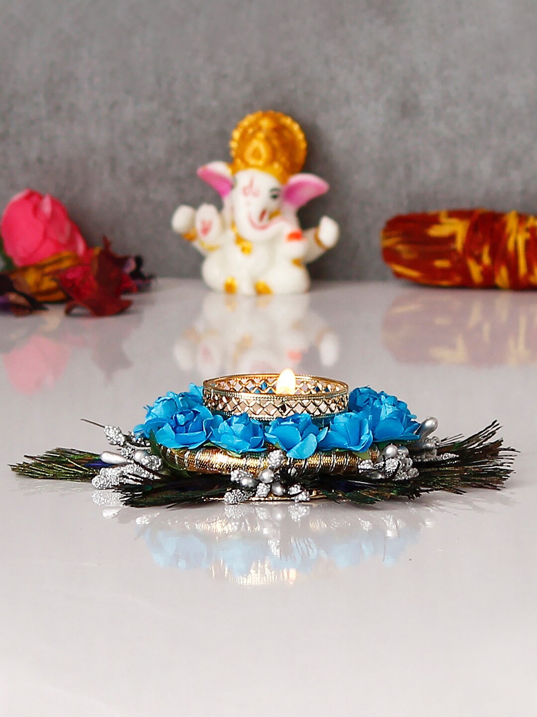 eCraftIndia Blue & Green Mor Pankh with Flowers Handcrafted Decorative Tea Light Candle Holder
eCraftIndia Blue & Green Mor Pankh with Flowers Handcrafted Decorative Tea Light Candle Holder