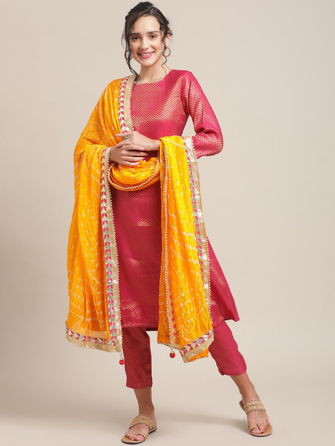 Varanga Women Pink & Gold Geometric Bandhani Self Design Kurta With Trousers & Dupatta
Varanga Women Pink & Gold Geometric Bandhani Self Design Kurta With Trousers & Dupatta