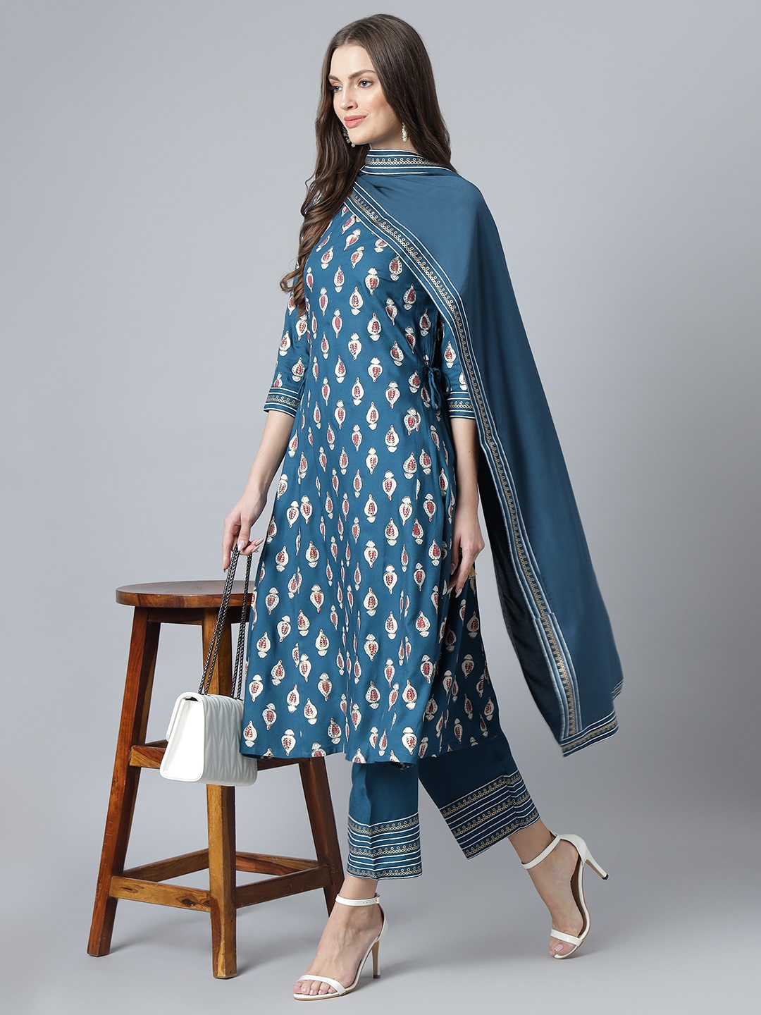 Khushal K Women Teal Ethnic Motifs Printed Regular Kurta with Palazzos & With Dupatta
Khushal K Women Teal Ethnic Motifs Printed Regular Kurta with Palazzos & With Dupatta