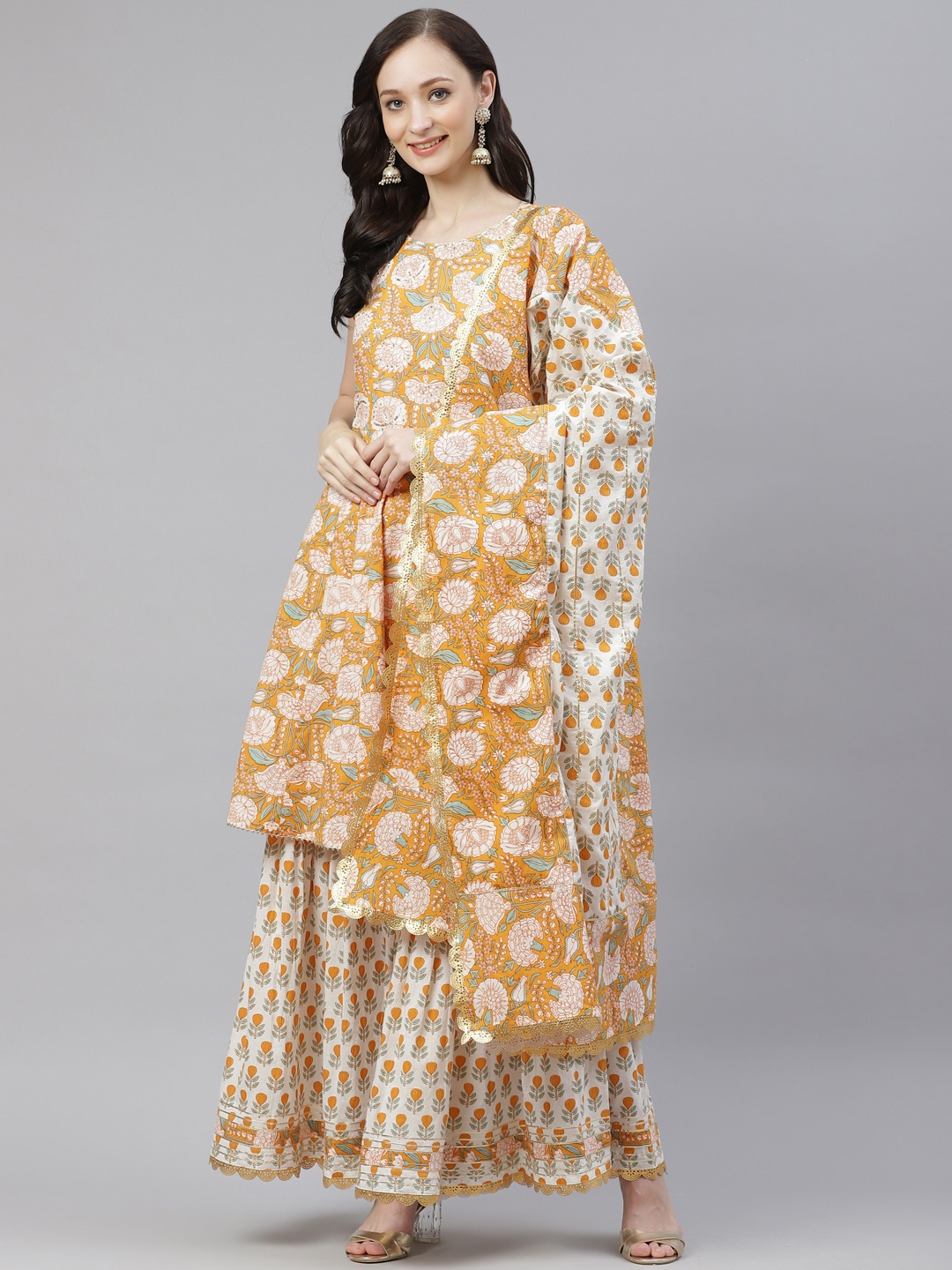 Divena Women Yellow Floral Printed Panelled Sequinned Pure Cotton Kurti with Sharara & With Dupatta
Divena Women Yellow Floral Printed Panelled Sequinned Pure Cotton Kurti with Sharara & With Dupatta