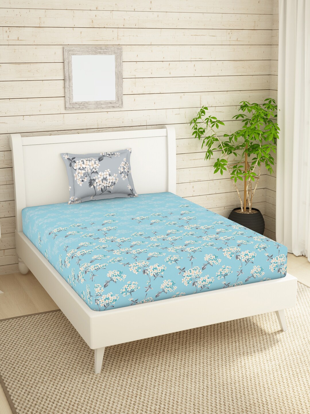 SPACES Blue & White Floral Printed 144 TC Cotton Single Bedsheet with 2 Pillow Covers
SPACES Blue & White Floral Printed 144 TC Cotton Single Bedsheet with 2 Pillow Covers