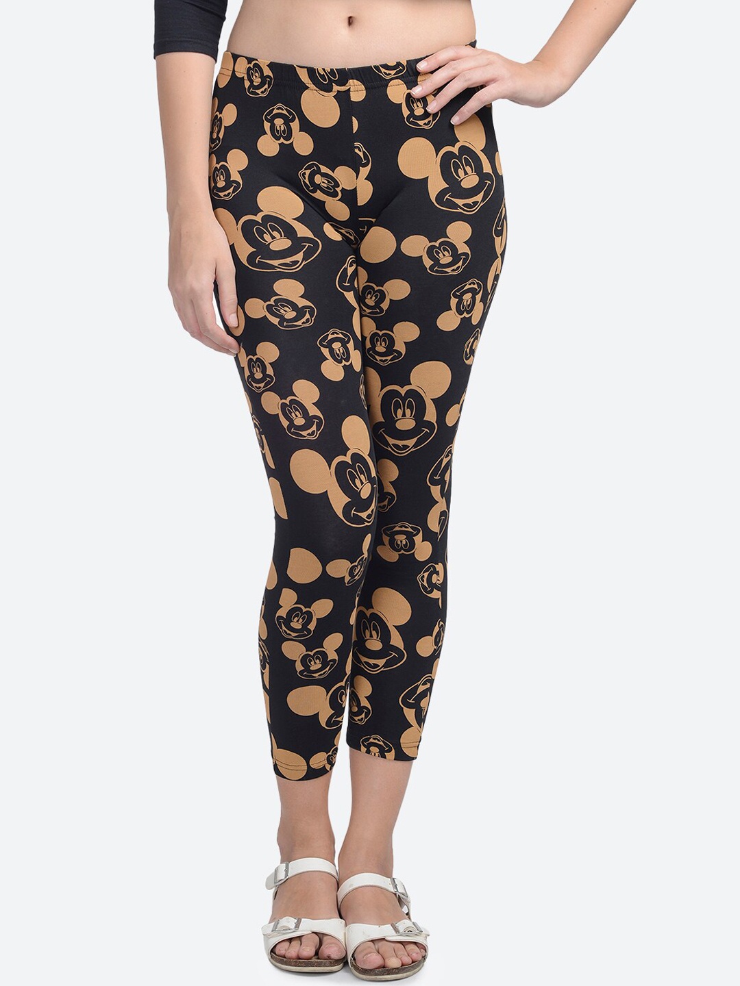 Free Authority Women Black & Beige Mickey Printed Three-Fourth Length Pure Cotton Leggings
Free Authority Women Black & Beige Mickey Printed Three-Fourth Length Pure Cotton Leggings