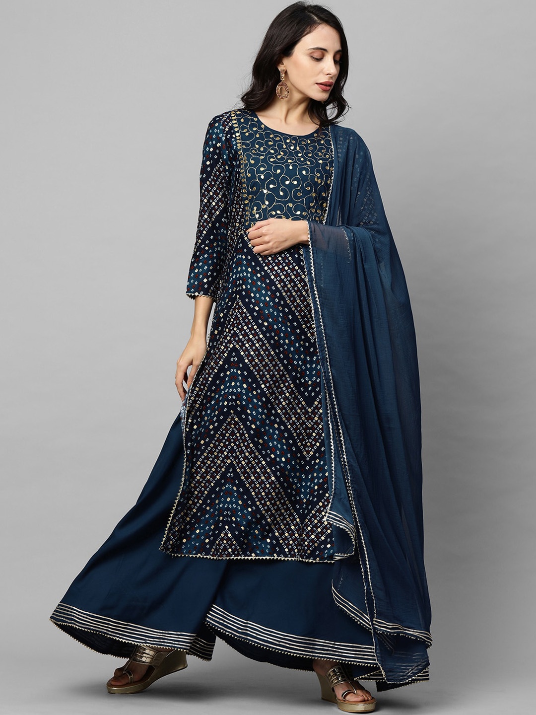 FASHOR Women Navy Blue Bandhani Printed Panelled Gotta Patti Kurta with Palazzos & With Dupatta
FASHOR Women Navy Blue Bandhani Printed Panelled Gotta Patti Kurta with Palazzos & With Dupatta