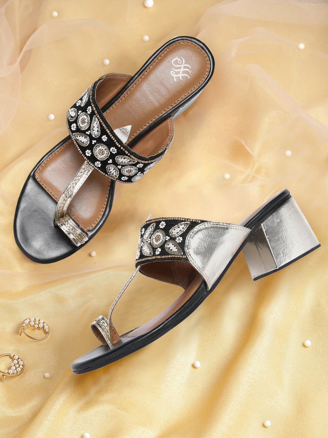 House of Pataudi Women Black & Gold-Toned Beads Embellished Leather Ethnic Block Heels
House of Pataudi Women Black & Gold-Toned Beads Embellished Leather Ethnic Block Heels