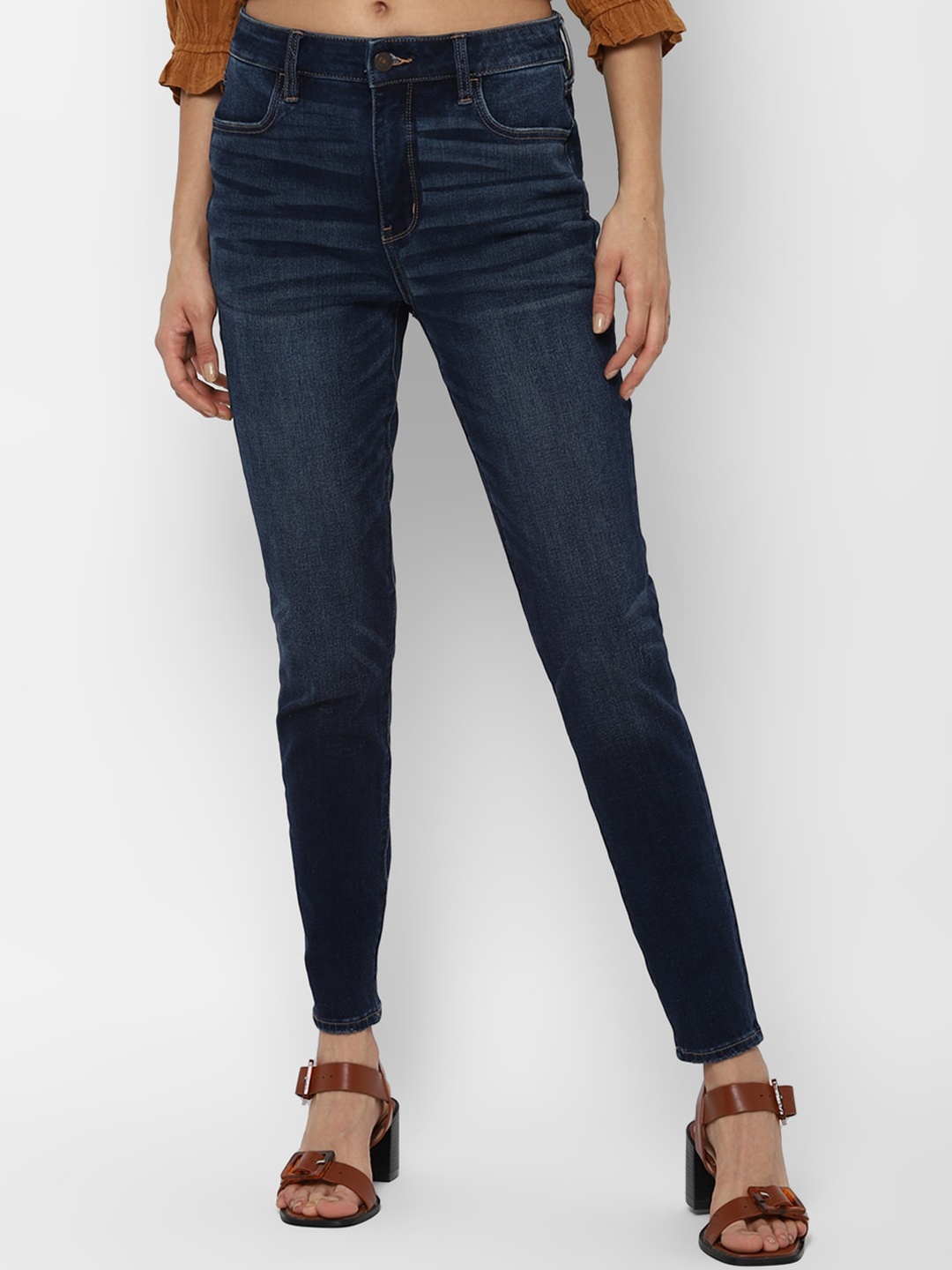 AMERICAN EAGLE OUTFITTERS Women Navy Blue Slim Fit High-Rise Light Fade Stretchable Jeans
AMERICAN EAGLE OUTFITTERS Women Navy Blue Slim Fit High-Rise Light Fade Stretchable Jeans