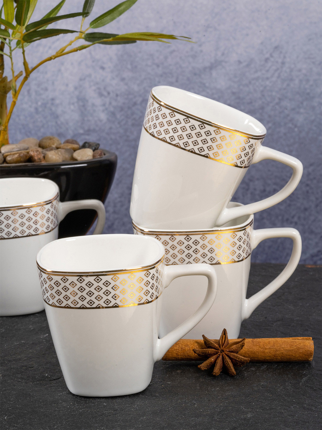 White Gold White & Gold-Toned Geometric Printed Porcelain Glossy Mugs Set of Cups and Mugs
White Gold White & Gold-Toned Geometric Printed Porcelain Glossy Mugs Set of Cups and Mugs