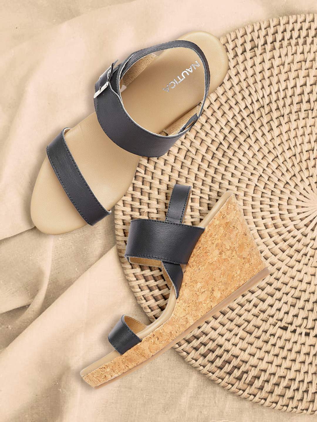 Nautica Navy Blue Leather Wedges
Nautica Navy Blue Leather Wedges