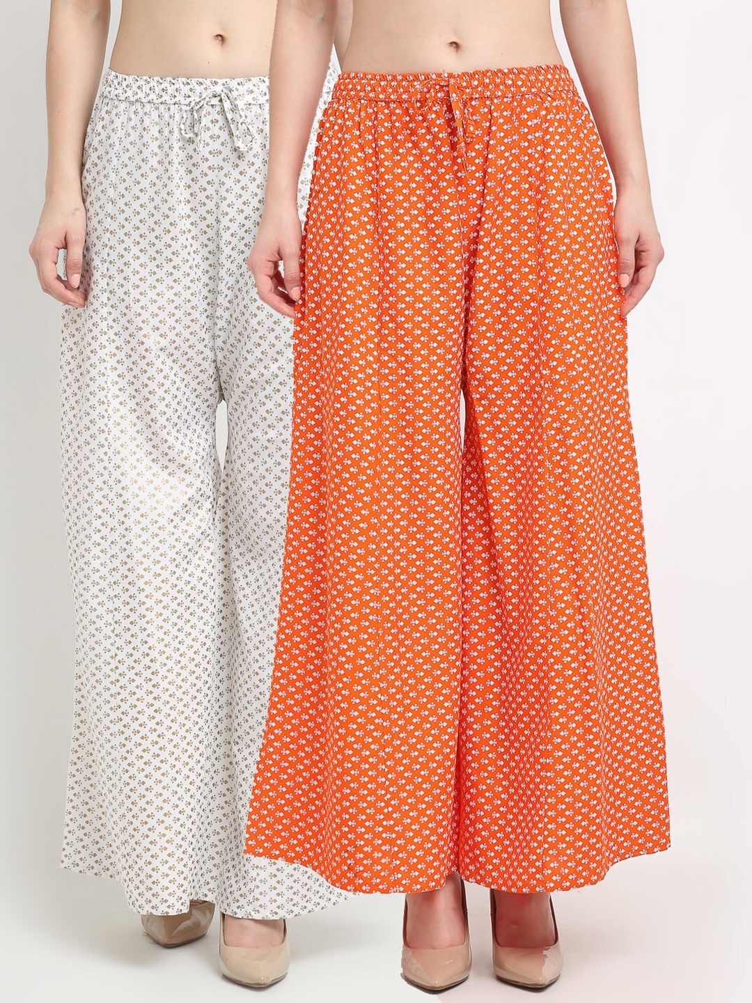 GRACIT Women Pack Of 2 White & Orange Floral Printed Flared Knitted Ethnic Palazzos
GRACIT Women Pack Of 2 White & Orange Floral Printed Flared Knitted Ethnic Palazzos