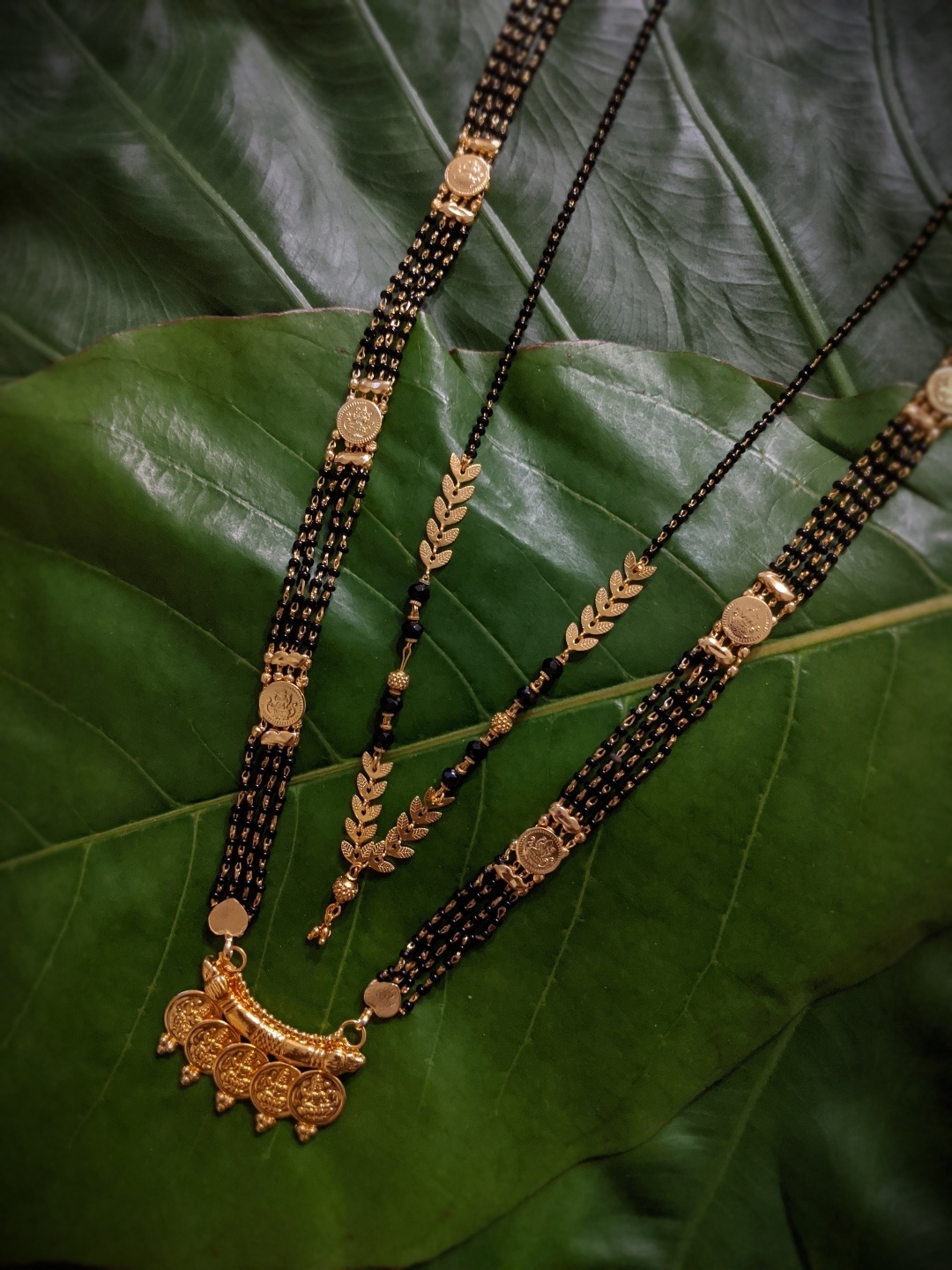Digital Dress Room Set Of 2 Gold-Plated Black Beaded Maharashtrian Style Mangalsutra
Digital Dress Room Set Of 2 Gold-Plated Black Beaded Maharashtrian Style Mangalsutra