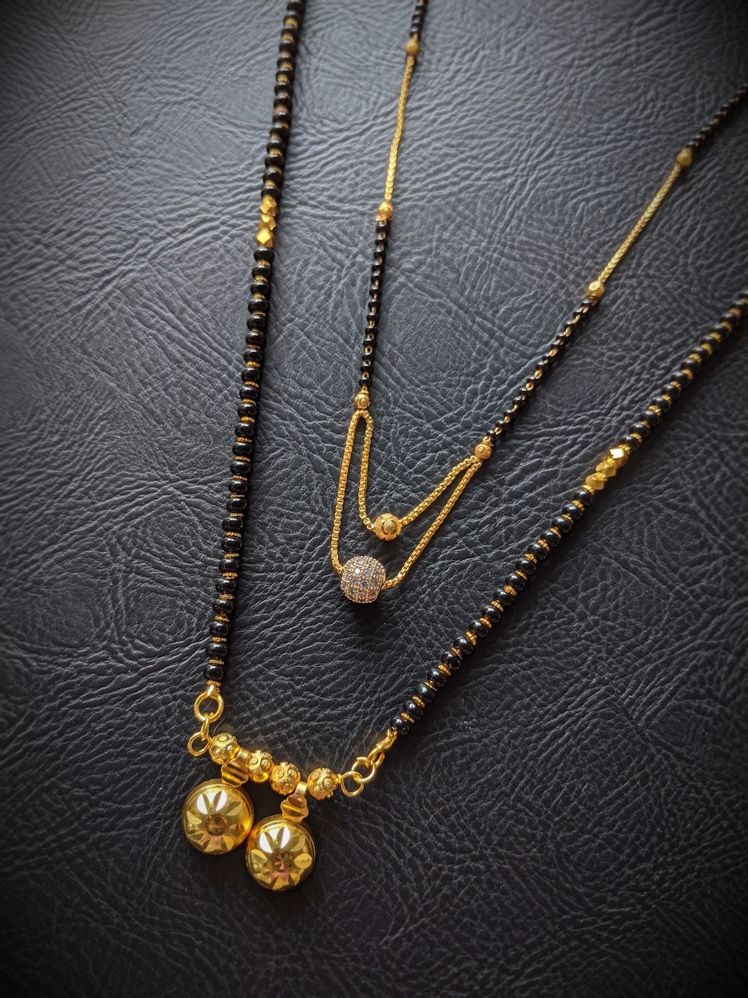 Digital Dress Room Set Of 2 Gold-Plated White & Black Stone-Studded & Beaded Mangalsutra
Digital Dress Room Set Of 2 Gold-Plated White & Black Stone-Studded & Beaded Mangalsutra