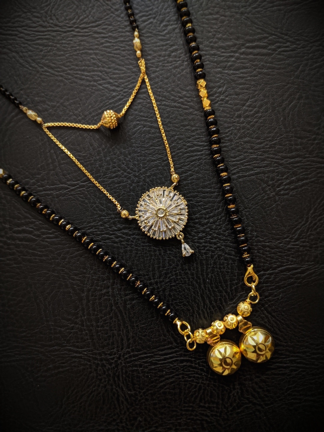 Digital Dress Room Set of 2 Gold Plated White Stone Studded & Black Beaded Mangalsutra
Digital Dress Room Set of 2 Gold Plated White Stone Studded & Black Beaded Mangalsutra